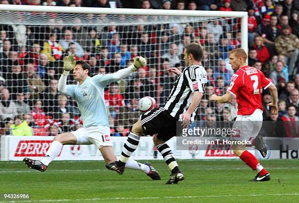 Kevin Nolan of Newcastle scores the opening goal during the Coca-Cola Championship game between Barnsley and Newcastle United at the Oakwell ground...