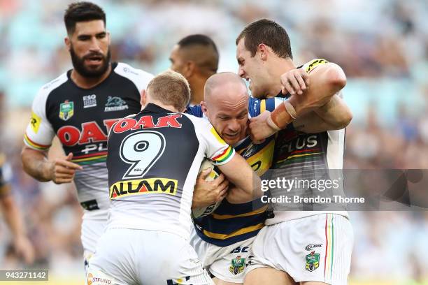 Beau Scott of the Eels is tackled by the Panthers defence during the round five NRL match between the Parramatta Eels and the Penrith Panthers at ANZ...