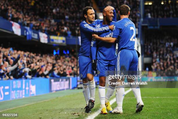 Nicolas Anelka of Chelsea celebrates with team mates Ricardo Carvalho and Branislav Ivanovic after scoring his sides second goal during the Barclays...