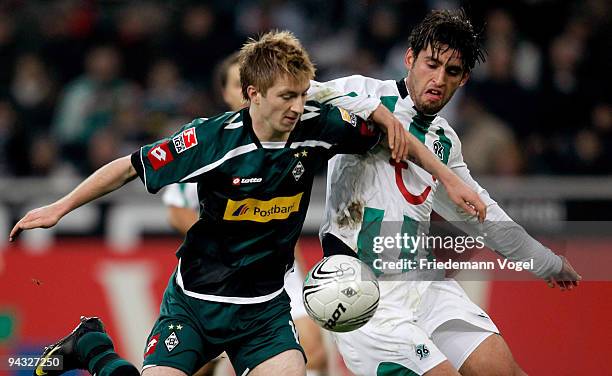 Karim Haggui of Hannover in action with Marco Reus of Moenchengladbach during the Bundesliga match between Borussia Moenchengladbach and Hannover 96...