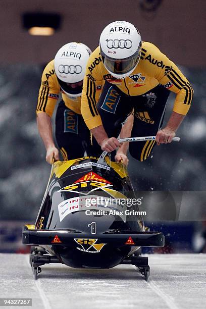 Pilot Beat Hefti and brakeman Thomas Lamparter of Switzerland compete to win the two-man bob competition during the FIBT Bob & Skeleton World Cup at...