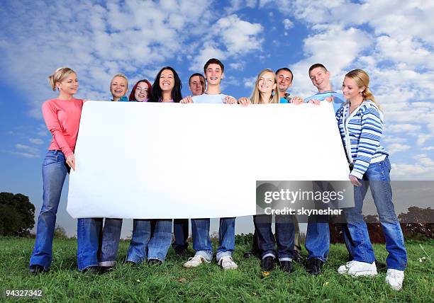 People Hold Paper Crowd Of People Holding Blank Paper Photos and Premium High Res ...
