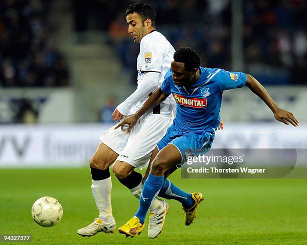 Chinedu Obasi of Hoffenheim battles for the ball with Selim Teber of Frankfurt during the Bundesliga match between TSG 1899 Hoffenheim and Eintracht...