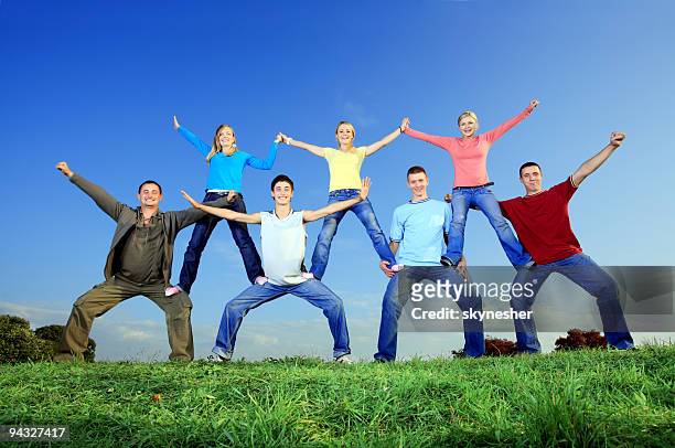 pyramid - of young people. - acrobatic activity stock pictures, royalty-free photos & images
