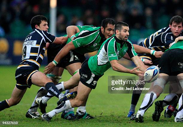 Frank Murphy of Connaught Rugby passes the ball out from the scrum as Worcester Warriors scrumhalf Jonny Orr tries to kick him during the Amlin...