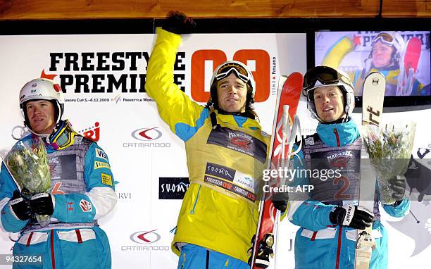 Third-placed Nathan Roberts of the United States, winner Jesper Bjornlund of Sweden and second-placed Bryon Wilson of the United States celebrate on...