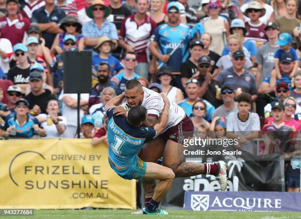 Addin Fonua-Blake of Manly collides with Michael Gordon of the Titans during the round five NRL match between the Gold Coast Titans and the Manly Sea...