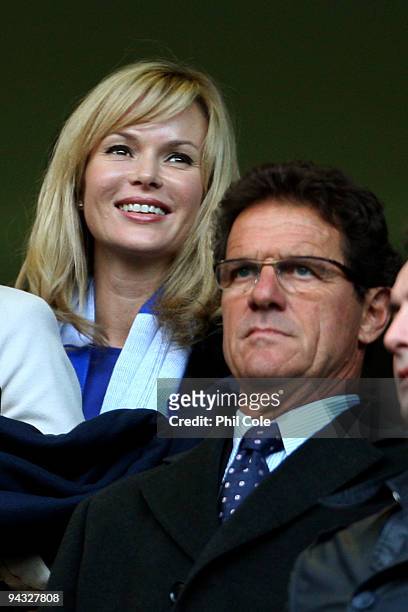 Tv presenter Amanda Holden and England manager Fabio Capello look on during the Barclays Premier League match between Chelsea and Everton at Stamford...