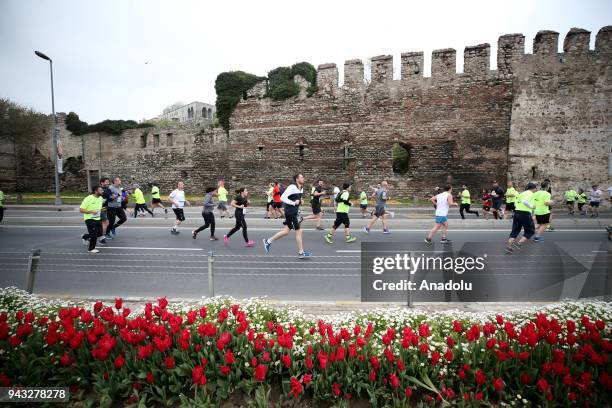 Participants compete in the 13th Vodafone Istanbul Half Marathon, started from the Yenikapi Square, in Istanbul, Turkey on April 08, 2018.