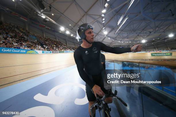 Edward Dawkins of New Zealand celebrates a games record time after he competes during the Men's 1000m Time Trial track cycling on day four of the...
