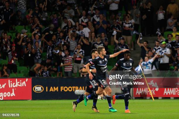 Leroy George and Terry Antonis of Melbourne Victory celebrate a goal during the round 26 A-League match between the Melbourne Victory and the...