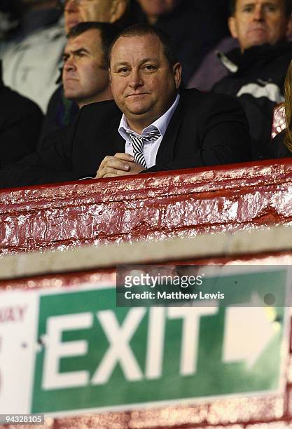 Mike Ashley, Chairman of Newcastle United looks on during the Coca-Cola Championship match between Barnsley and Newcastle United at Oakwell on...