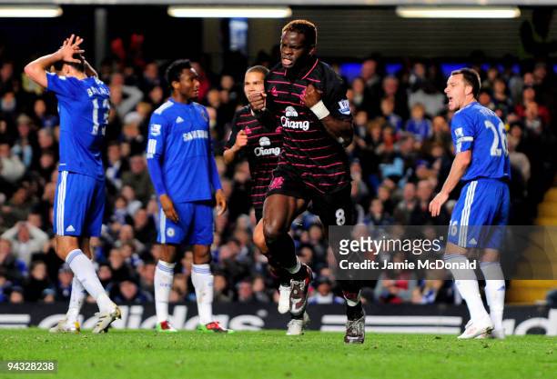 Louis Saha of Everton celebrates after scoring his team's third goal during the Barclays Premier League match between Chelsea and Everton at Stamford...