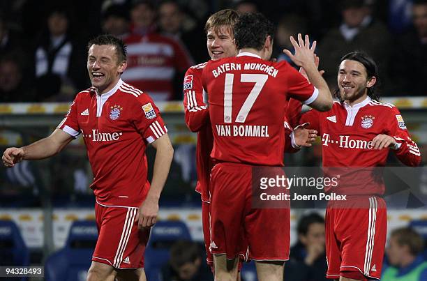 Danijel Pranjic of Bayern celebrates with his team mates Ivica Olic, Mark van Bommel and Holger Badstuber after scoring his team's fourth goal during...