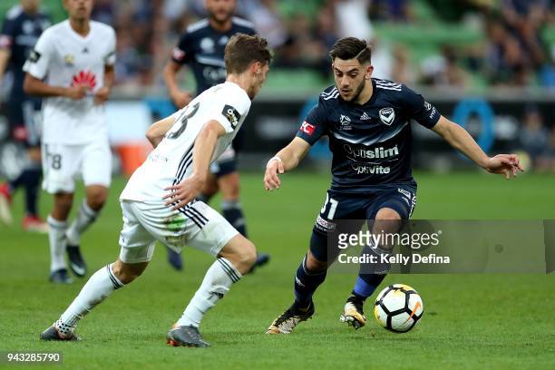 Christian Theoharous of Melbourne Victory runs with the ball during the round 26 A-League match between the Melbourne Victory and the Wellington...