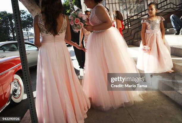 Revelers gather at a quinceanera party, near the U.S.-Mexico border, on April 7, 2018 in Tijuana, Mexico. President Trump has issued a decree for the...