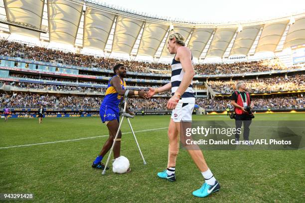 Mark Blicavs of the Cats shakes hands with Liam Ryan of the Eagles during the 2018 AFL round 03 match between the West Coast Eagles and the Geelong...