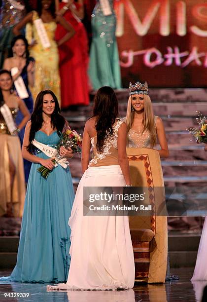 Miss Gibraltar Kaiane Aldorino is crowned Miss World 2009 by Miss World 2008 Ksenia Shipilova as runner up Miss Mexico Perla Beltran Acosta looks on...