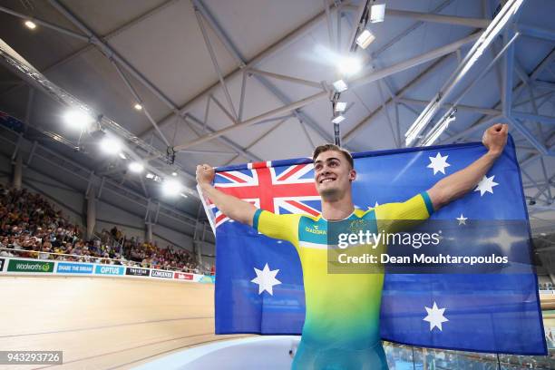 Matt Glaetzer of Australia celebrates a games record time after he competes and wins the Men's 1000m Time Trial track cycling on day four of the Gold...