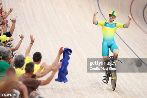 Matt Glaetzer of Australia celebrates winning the Men's 1000m Time Trial during Cycling on day four of the Gold Coast 2018 Commonwealth Games at Anna...