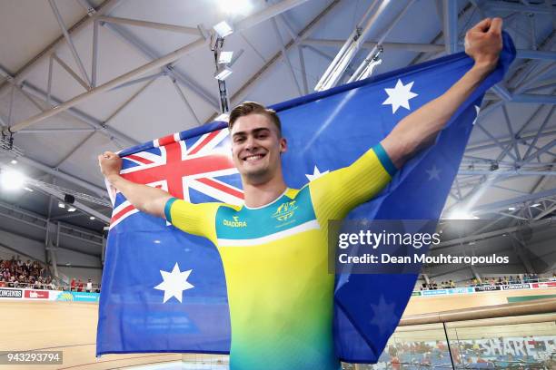 Matt Glaetzer of Australia celebrates a games record time after he competes and wins the Men's 1000m Time Trial track cycling on day four of the Gold...