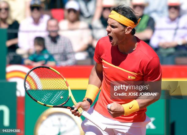 Spain's Rafa Nadal celebrates a point during the Davis Cup quarter-final tennis match against Germany at the bullring of Valencia, on April 8, 2018....