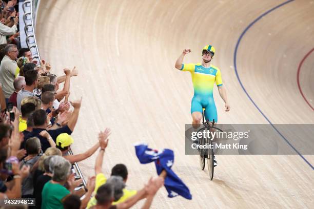 Matt Glaetzer of Australia celebrates winning the Men's 1000m Time Trial during Cycling on day four of the Gold Coast 2018 Commonwealth Games at Anna...