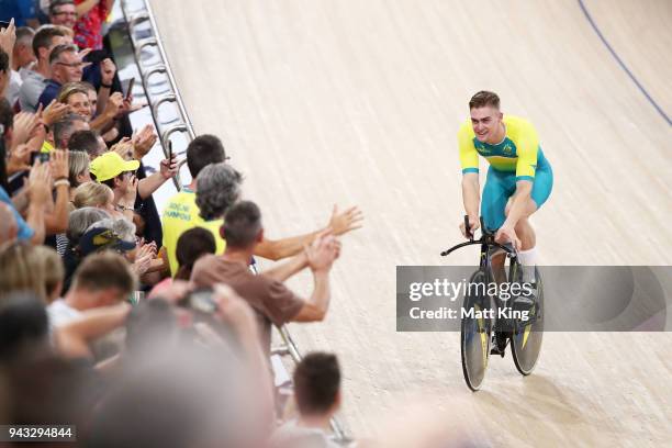 Matt Glaetzer of Australia celebrates with family after winning the Men's 1000m Time Trial during Cycling on day four of the Gold Coast 2018...