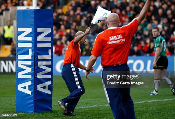 Amlin sponsored linesmen signal a successful penalty next to the goalposts during the Amlin Challenge Cup match between Worcester Warriors and...