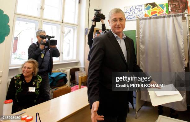 Opposition prime minister candidate Ferenc Gyurcsany of the 'Democratic Coalition' gestures before cast his ballot in a polling station located in a...
