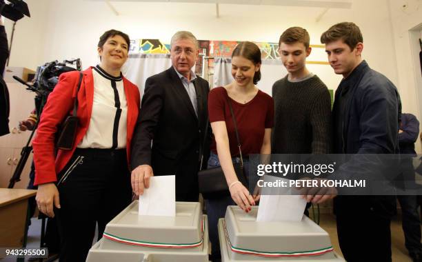 Opposition prime minister candidate Ferenc Gyurcsany of the 'Democratic Coalition', his wife Klara Dobrev and their family cast their ballots in a...