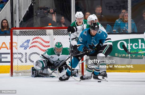 Mike McKenna, Julius Honka and Dan Hamhuis of the Dallas Stars defend the net against Kevin Labanc of the San Jose Sharks at SAP Center on April 3,...