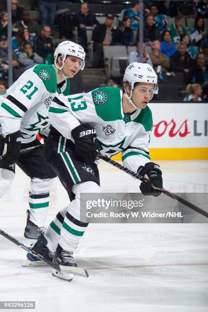 Mattias Janmark and Antoine Roussel of the Dallas Stars skate against the San Jose Sharks at SAP Center on April 3, 2018 in San Jose, California....