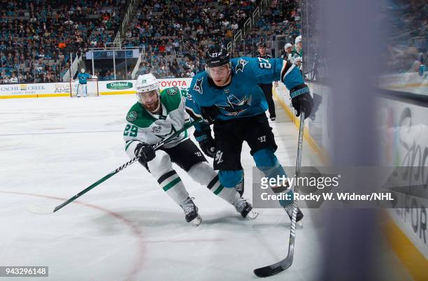 Joonas Donskoi of the San Jose Sharks skates after the puck against Greg Pateryn of the Dallas Stars at SAP Center on April 3, 2018 in San Jose,...