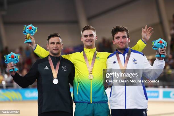 Silver medalist, Edward Dawkins of New Zealand, Gold medalist, Matt Glaetzer of Australia and Bronze medalist, Callum Skinner of Scotland pose on the...