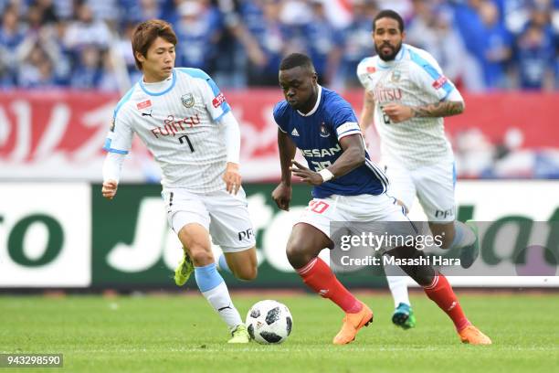 Olivier Boumal of Yokohama F.Marinos and Shintaro Kurumaya of Kawasaki Frontale compete for the ball during the J.League J1 match between Yokohama...