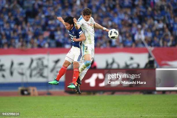 Tatsuki Nara of Kawasaki Frontale and Kaina Yoshio of Yokohama F.Marinos compete for the ball during the J.League J1 match between Yokohama F.Marinos...