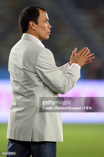 Coach Jose Cruz of Atlante aplauds his team during the FIFA Club World Cup quarter-final match between Auckland City and Atlante at the Zayed Sports...