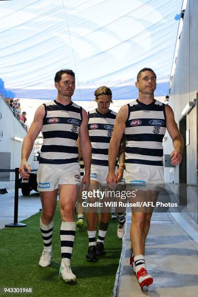 The Cats leave the field after the teams defeat during the round three AFL match between the West Coast Eagles and the Geelong Cats at Optus Stadium...