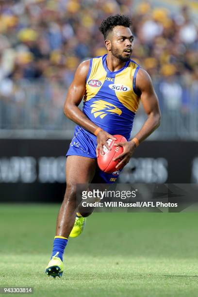 Willie Rioli of the Eagles looks to pass the ball during the round three AFL match between the West Coast Eagles and the Geelong Cats at Optus...