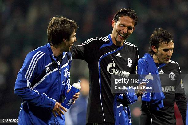 Kevin Kuranyi of Schalke jokes with team mate Jan Moravek after the Bundesliga match between Werder Bremen and FC Schalke 04 at the Weser stadium on...