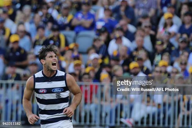 Tom Hawkins of the Cats celebrates after scoring a goal during the round three AFL match between the West Coast Eagles and the Geelong Cats at Optus...