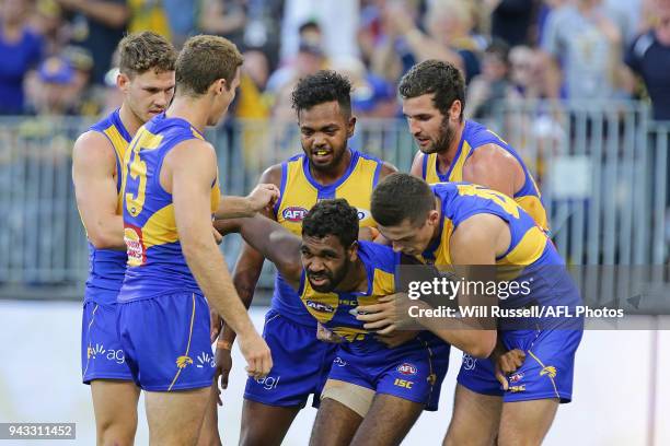 Liam Ryan of the Eagles is assisted by team mates after an injury during the round three AFL match between the West Coast Eagles and the Geelong Cats...