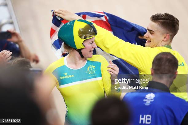 Stephanie Morton of Australia celebrates with Matt Glaetzer of Australia after winning the Women's Keirin Final during Cycling on day four of the...