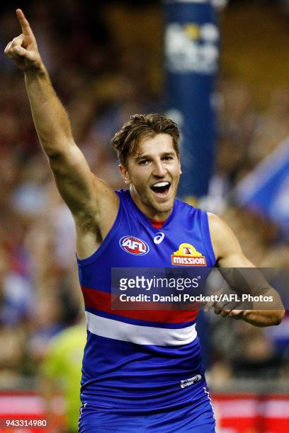 Marcus Bontempelli of the Bulldogs celebrates a goal during the round three AFL match between the Western Bulldogs and the Essendon Bombers at Etihad...