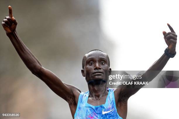 Winner Kenneth Kipkemoi of Kenia celebartes during the 2018 Rotterdam Marathon in Rotterdam, Netherlands, on April 8, 2018. / AFP PHOTO / ANP / Olaf...