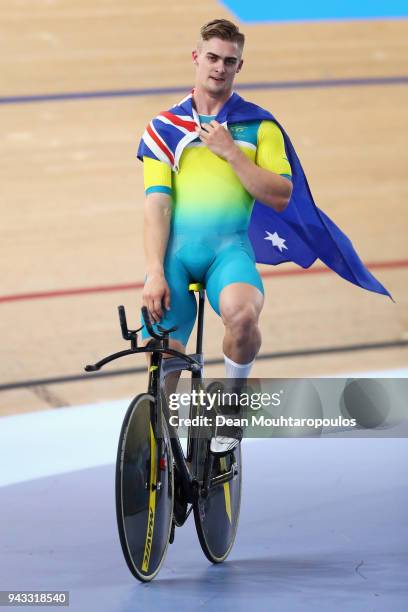 Matt Glaetzer of Australia celebrates a games record time after he competes and wins the Men's 1000m Time Trial track cycling on day four of the Gold...