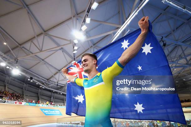 Matt Glaetzer of Australia celebrates a games record time after he competes and wins the Men's 1000m Time Trial track cycling on day four of the Gold...