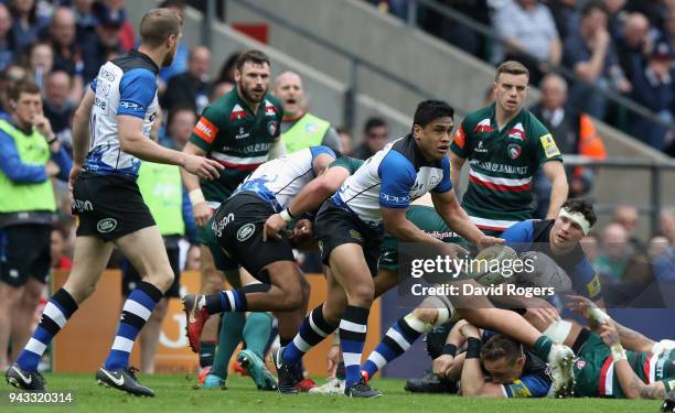 Ben Tapuai of Bath passes the ball during the Aviva Premiership match between Bath Rugby and Leicester Tigers at Twickenham Stadium on April 7, 2018...