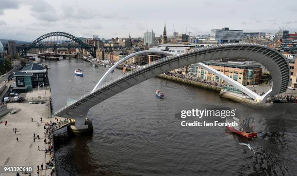 Fishing boats pass under the Millenium Bridge on the River Tyne in North Shields as fishermen take part in a nationwide protest against the Brexit...